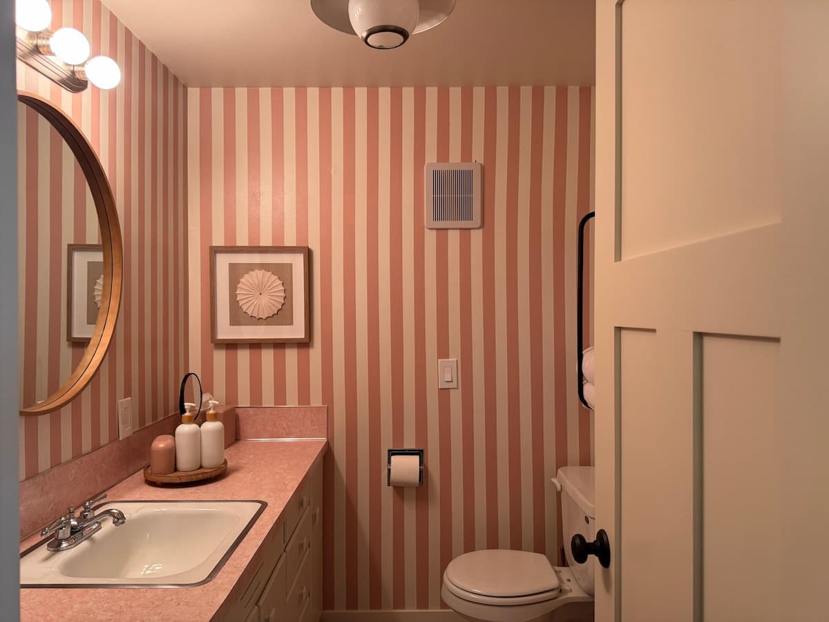 The pink bathroom, from the door.