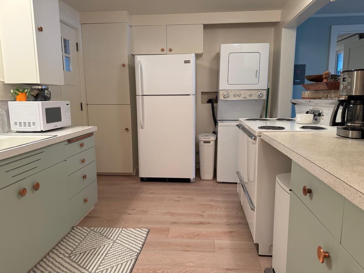 The kitchen, looking toward the fridge.
