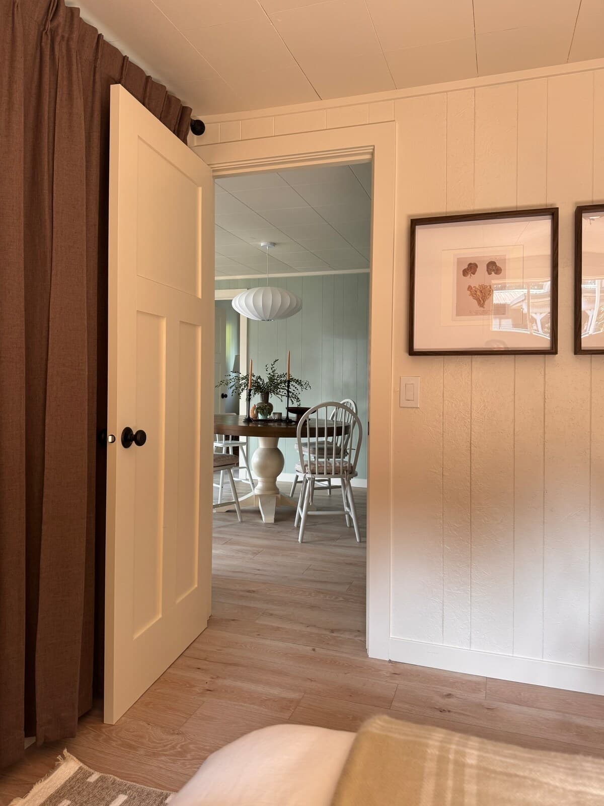 From the main bedroom through to the dining room.